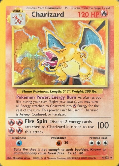 Charizard 4/102 from Base Set, the Unlimited print, photographed: no stamp, a drop shadow along the right of the art box, thick HP text.