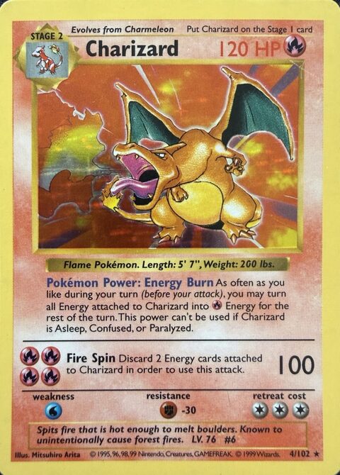 Charizard 4/102 from Base Set, Shadowless, photographed: no stamp, no drop shadow on the art box, thin HP text.
